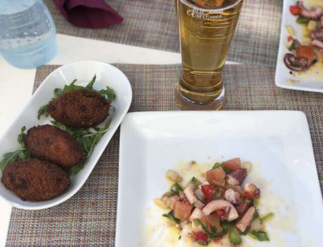 Photo: the best in Casa da Guia's restaurants: Octopus salad, cod ball and sangria drink or beer
